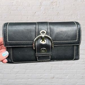 Vintage Coach large black leather wallet with buckle snap closure